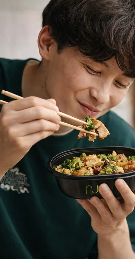 Person enjoying a Nuvi meal