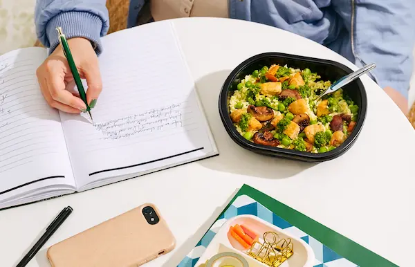 Writing and meal prep lifestyle image